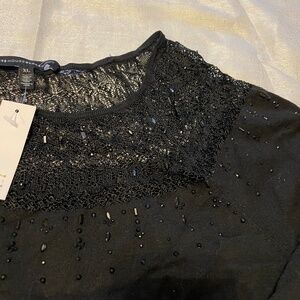 Embellished knit sweater